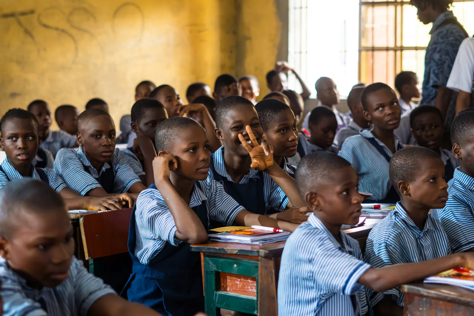 Students listening together in their classroom
