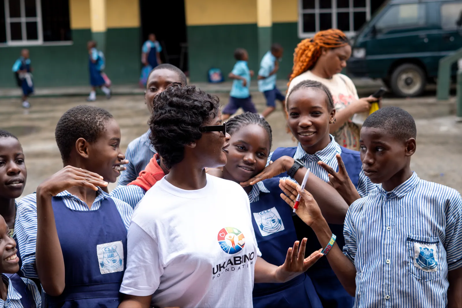 Ukabino volunteers and students sharing a joyful moment